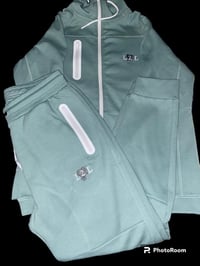 Teal track suit 