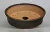 Round bonsai pot in a matte bronze glaze. D.242mm