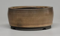 Image 1 of Round bonsai pot in a matte tan glaze. D.140mm