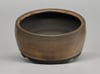 Round bonsai pot in a matte tan glaze. D.140mm