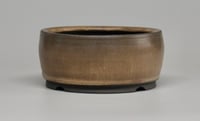 Image 4 of Round bonsai pot in a matte tan glaze. D.140mm