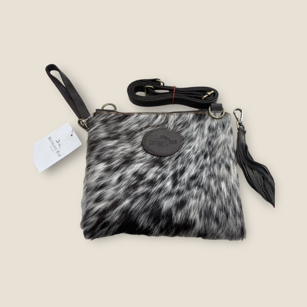 Image of THE TARRANT COWHIDE MULTIWAY - BROWN