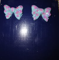 Image 1 of Bow studs in variety of colors  