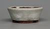 Round bonsai pot in a matte white crackle glaze. D.97mm