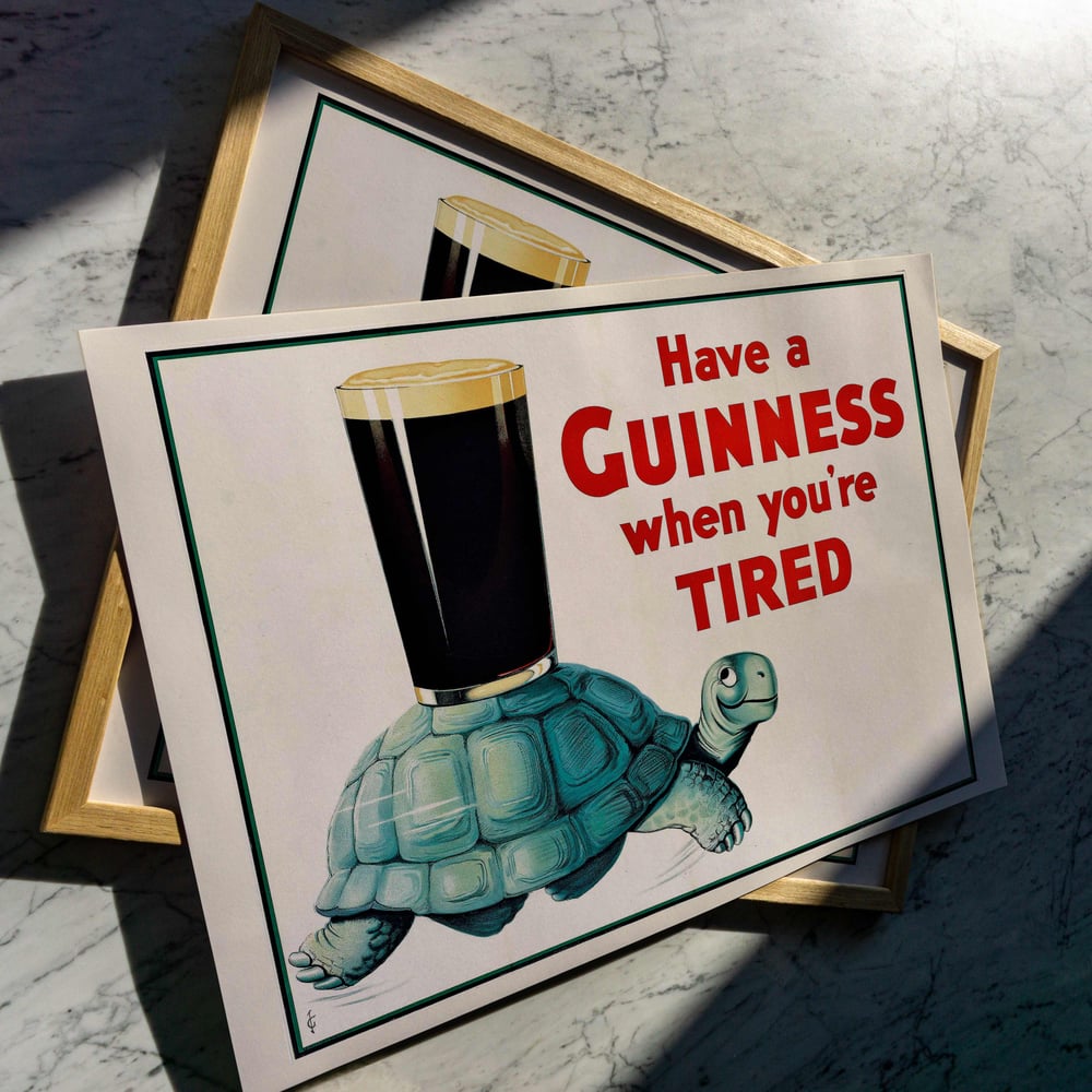 Classic Guinness poster with Turtle illustration from 1930s advertising campaign