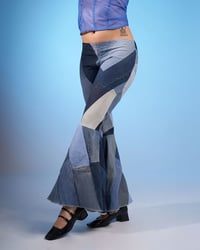 Image 1 of FLARED PATCHWORK DENIM TROUSERS