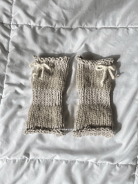 Image 2 of striped handwarmers in grey