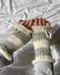 Image of striped cream & sage green handwarmers