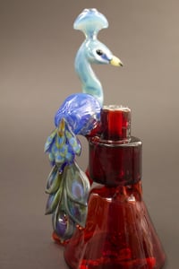 Image 1 of Peacock on a pedestal 