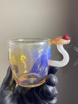 Image of Teacup with mushroom handle and ladybug