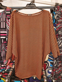 Batwing top/dress in orange/black houndstooth