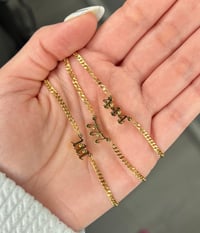 protected by angels necklace :')
