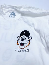 Image 1 of TYGA WOULDS GOLF CLUB TEE 2024