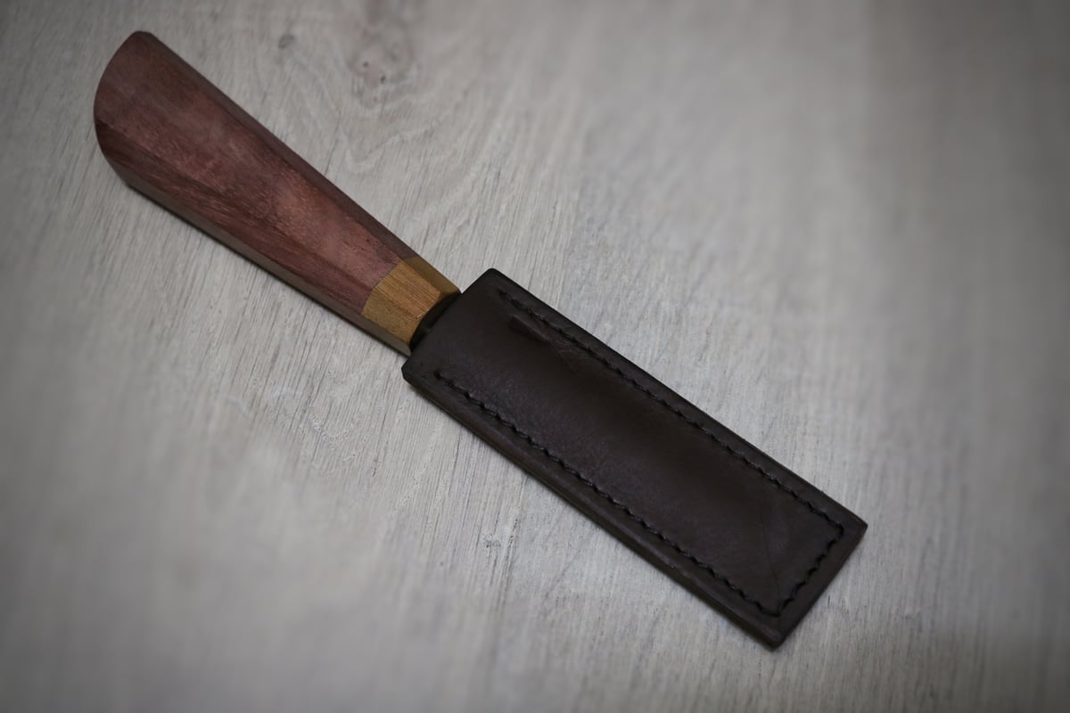 Image of 90mm and 100mm slöjd handled in purpleheart and greenheart