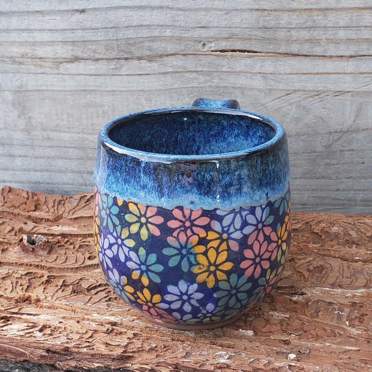 Image of 10oz. Daisy Kaleidoscope mug, Blue, Red clay