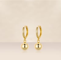 Image 1 of Huggie Gold Ball Earrungs 
