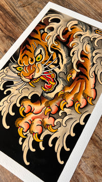 Image 1 of Tiger attack in water
