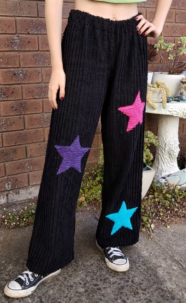Image of Black chenille Pants with pink, purple, blue stars