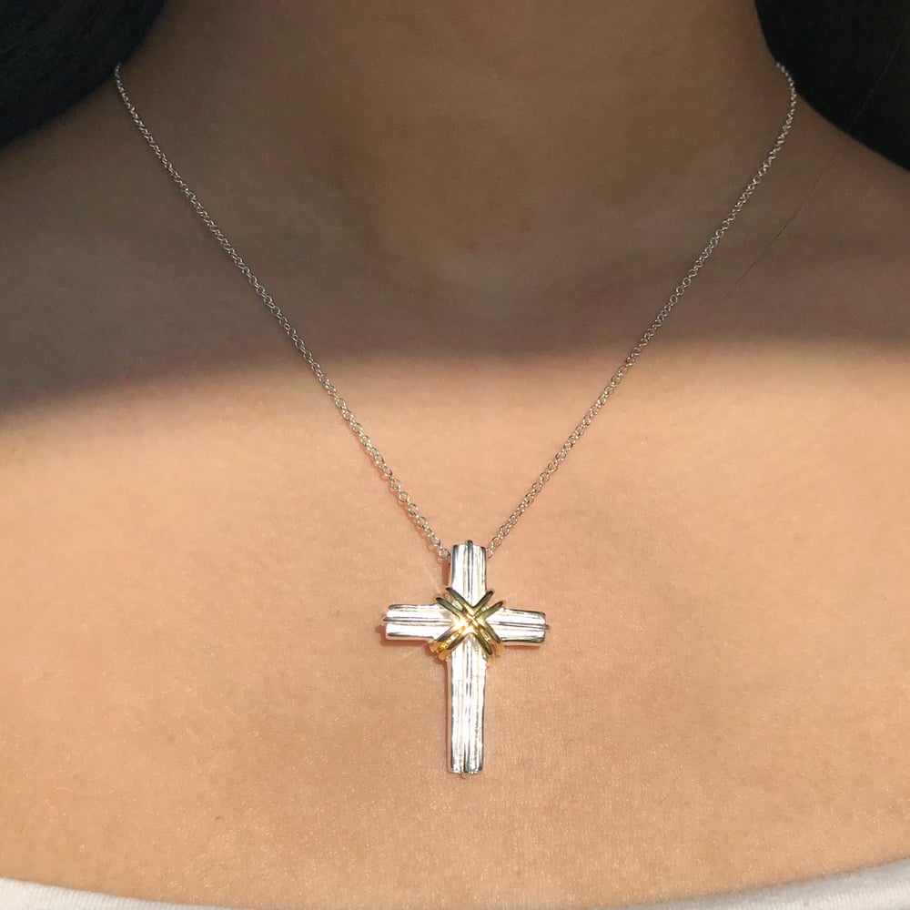 Image of Sterling silver cross with gold wrap