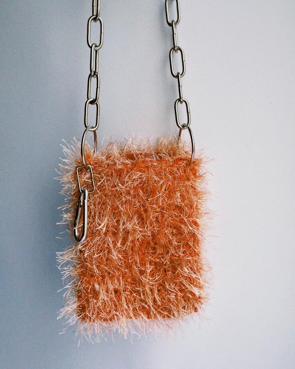 Image of Fluffy crocheted phone bag no.1