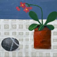 Image of Still life with plant and pebble