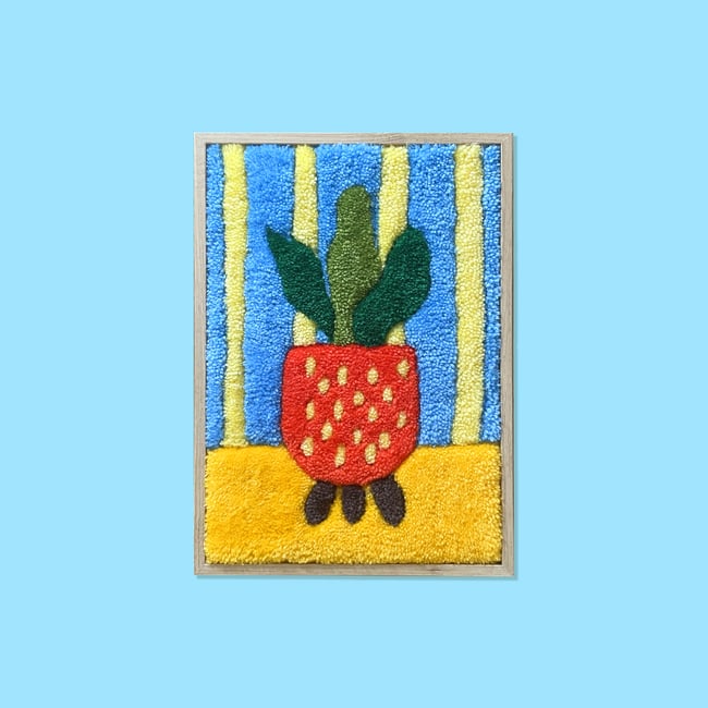 TAPIS ENCADRÉ - LA PLANTE VERTE EN POT