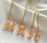 Image 2 of Gold floral initial necklaces