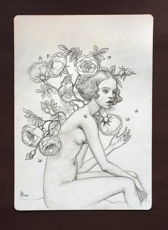 Image of Drawing of a woman growing flower wings