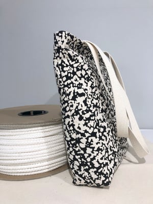 Image of TOTE - Static