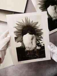 Image 1 of "A suffering Person hiding behind their light" darkroom print
