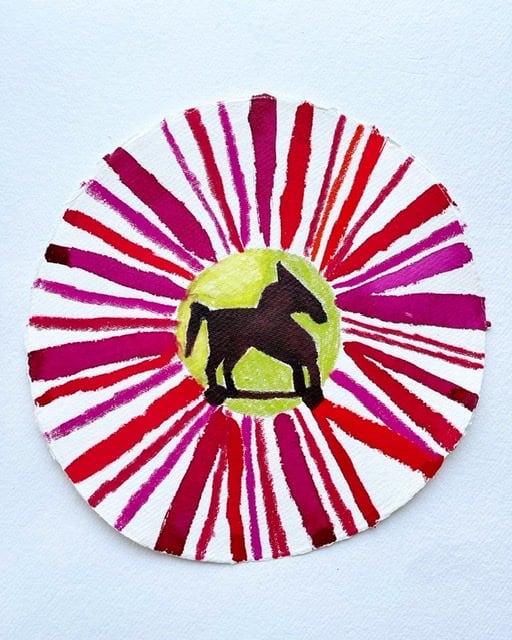 Image of pink and acid green rocking horse 