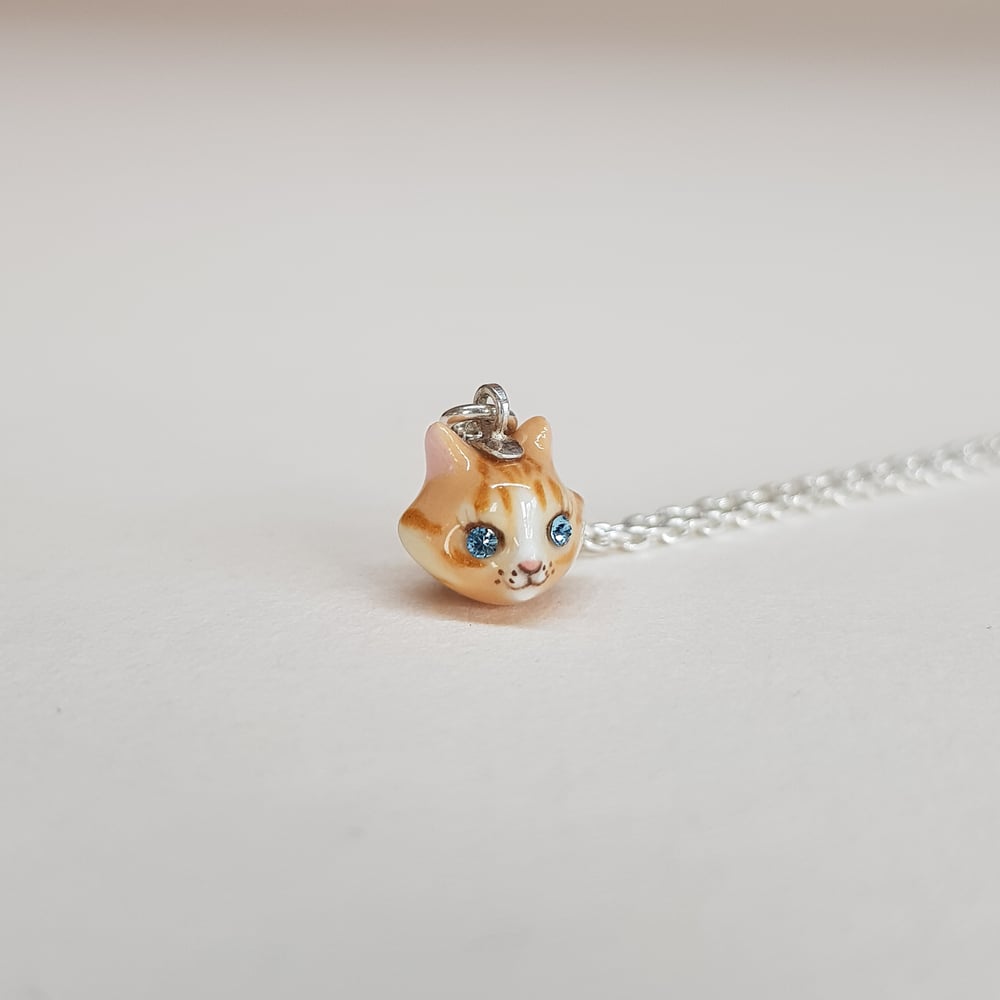 Image of Ginger Tabby Porcelain & Sterling Silver Teeny Tiny Cat Pendant