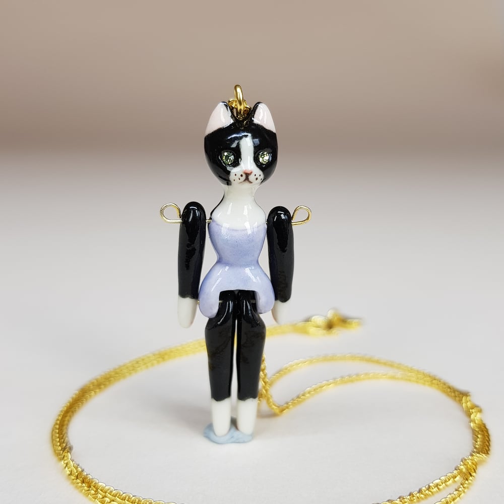 Image of Tuxedo Porcelain & Gold Vermeil Articulated Doll Pendant