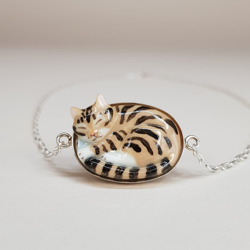 Image of Brown Tabby Porcelain & Sterling Silver Sleeping Kitten Pendant