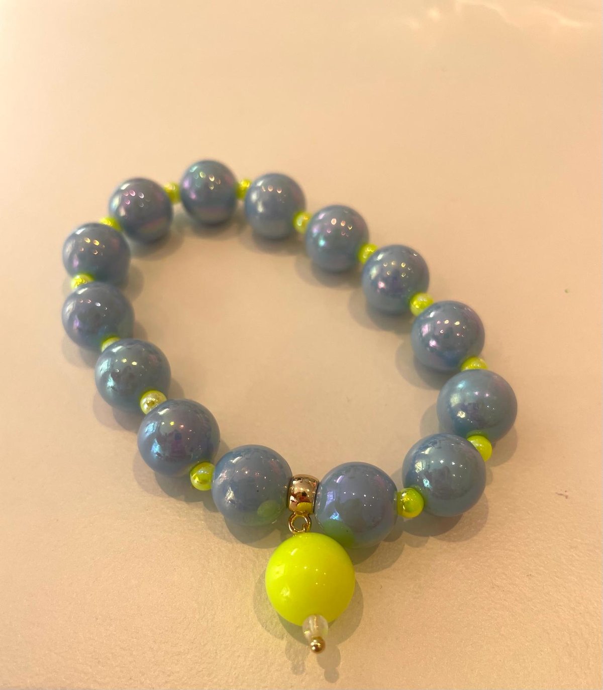 Image of Blue and neon yellow by Love Beth