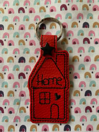 Porte clés home 4