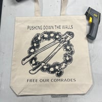 Pushing Down The Walls Tote Bag