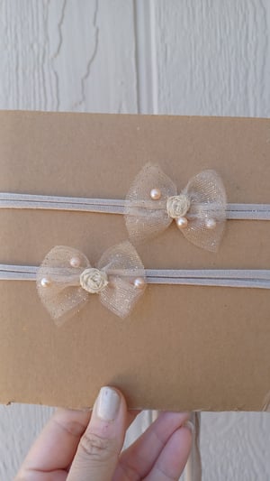 Image of Dainty bow