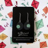 Ceramic earrings - charcoal with soft green spot