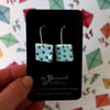 Ceramic earrings - mint with blue/black spots