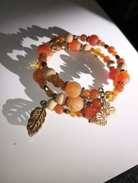 Image 2 of Orange Butterfly and Leaf Wrap Around bracelet