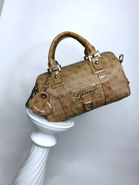 Image 1 of 🎀 ANGEL CAPSULE 🎀 GUESS 2000S BABYDOLL BROWN MONOGRAM HEART KEYCHAIN SPEEDY BAG