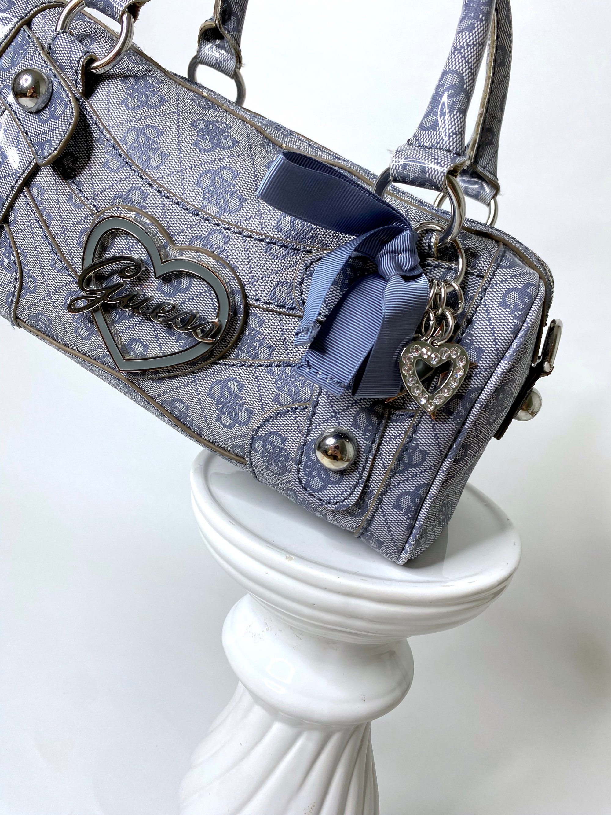 Guess bag with charms best sale