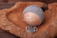 Image 4 of Knitted wrap pillow and bonnet hats light grey