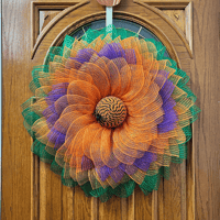 Image 1 of Orange and Purple Sunflower Wreath with Green Leaves