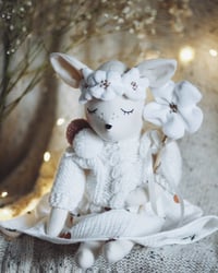 Deer doll with flowers
