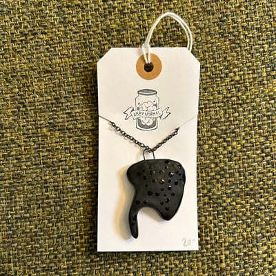 Image of slayer sting ray ceramic necklace