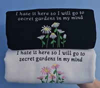 I hate it here so I will go back to the secret garden in my mind sweater