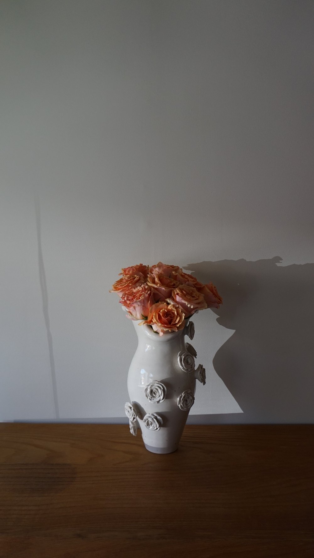 Image of "The white rose vase”