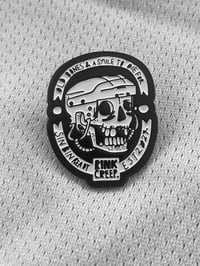 Old Bones enamel badge